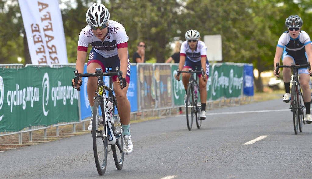 ROAD TO SUCCESS: Kristina Clonan powers to victory in the junior event at the Oceania Road Cycling Championships in Toowoomba yesterday. ROAD TO SUCCESS: Kristina Clonan powers to victory in the junior event at the Oceania Road Cycling Championships in Toowoomba yesterday.